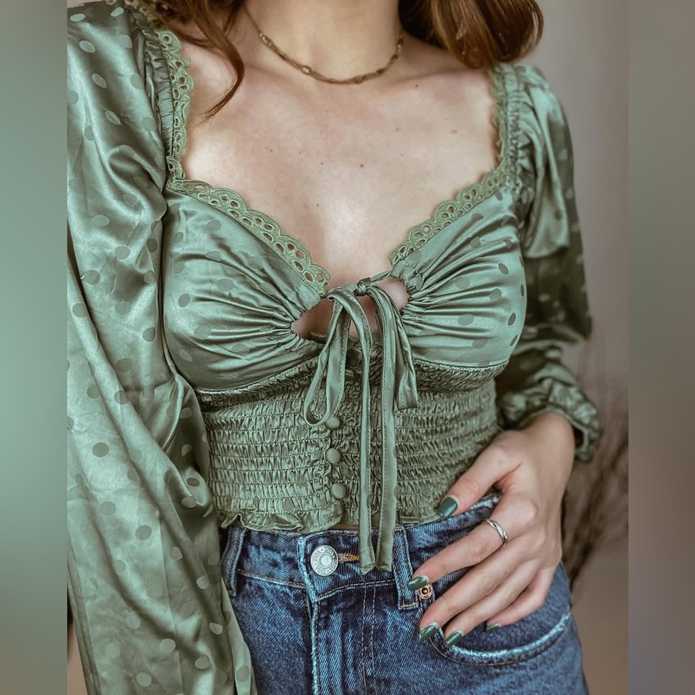 In the beginning, green polkadot scrunched, long sleeve crop top